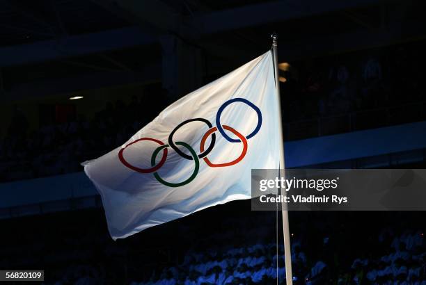 The Olympic flag is seen during the Opening Ceremony of the Turin 2006 Winter Olympic Games on February 10, 2006 at the Olympic Stadium in Turin,...