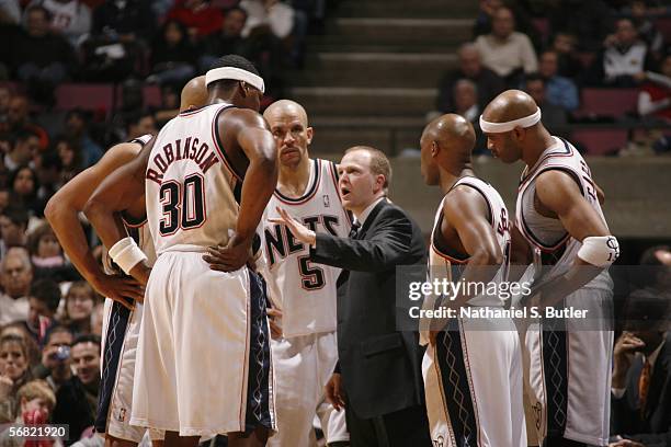 Head coach Lawrence Frank of the New Jersey Nets talks to his team during their game against the San Antonio Spurs at the Continental Airlines Arena...