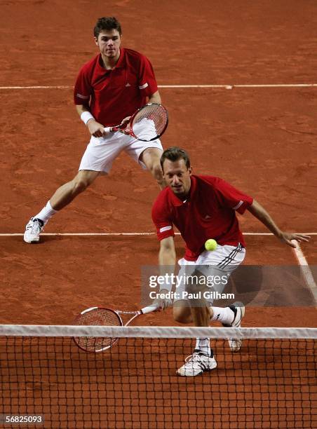 Yves Allegro and Stanislas Wawrinka of Switzerland in action during the third rubber between doubles pair Yves Allegro and Stanislas Wawrinka of...