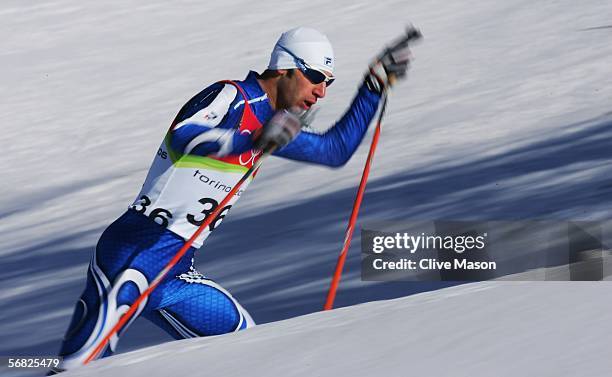 Daniele Munari of Italy competes in the Nordic Combined 15km Individual event on Day 1 of the 2006 Turin Winter Olympic Games on February 11, 2006 in...