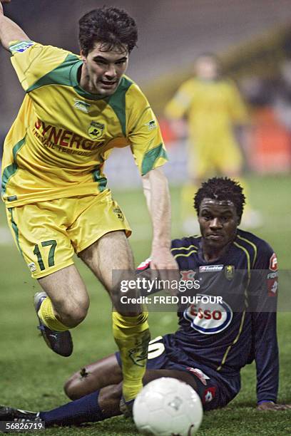 Nantes' midfielder Jeremy Toulalan vies with Sochaux's Cameroonian midfielder Valery Mezague during the French L1 football match Nantes vs. Sochaux,...