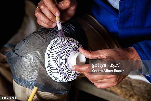 traditional pottery painting. - fez morocco stock pictures, royalty-free photos & images