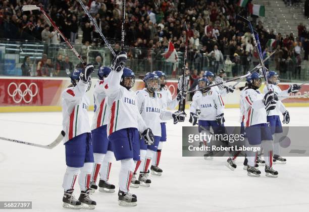 Team Italy waves to the crowd after losing 16-0 to Canada in the women's ice hockey Preliminary Round Group A match during Day 1 of the Turin 2006...
