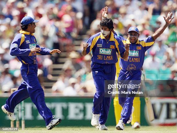 Chaminda Vaas of Sri Lanka celebrates the wicket of Simon Katich of Australia during the Second Final of the VB Series between Australia and Sri...