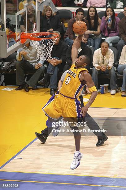 Kobe Bryant of the Los Angeles Lakers dunks against the Memphis Grizzlies on February 11, 2006 at Staples Center in Los Angeles, California. NOTE TO...