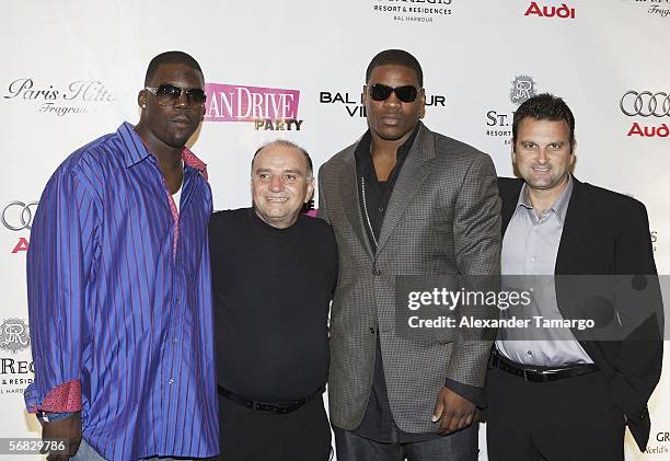 Miami Dolphins tight end Randy McMichael, Jerry Powers, Chicago Bears defensive end Adewale Ogunleye and sports agent Drew Rosenhaus make an...