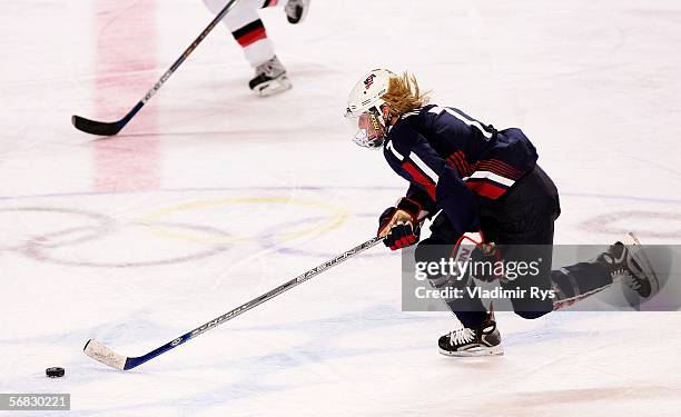 Krissy Wendell of the United States skates down the ice during the women's ice hockey Preliminary Round Group B match against Switzerland on Day 1 of...