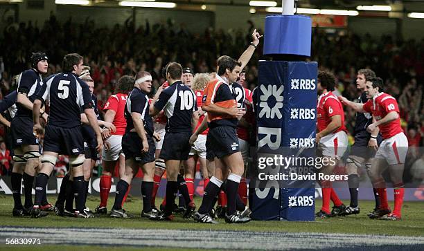 Referee Steve Walsh of New Zealand awards Wales a penalty try during the RBS Six Nations Championship match between Wales and Scotland at the...