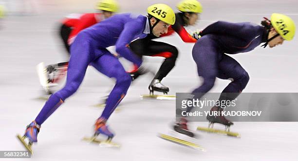 The Netherland's Niels Kerstholt competes during the Men's 1500 m competition during the Short Track competition at the 2006 Winter Olympics 12...