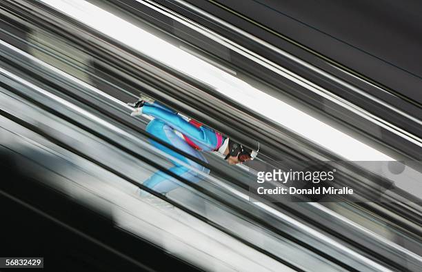 Jernej Damjan of Slovenia competes in the Normal Hill Individual Ski Jumping Final on Day 2 of the 2006 Turin Winter Olympic Games on February 12,...