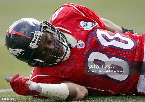 Blood runs down the face of wide receiver Rod Smith of the AFC team after a play against the NFC team during the NFL Pro Bowl on February 12, 2006 at...