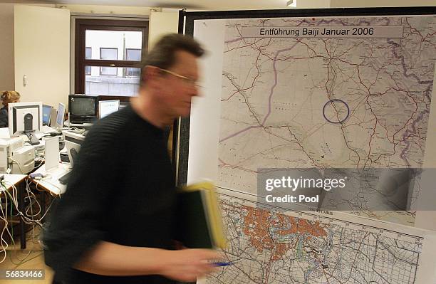 Worker is seen at the crisis reaction centre in the German foreign ministry on February 12, 2006 in Berlin, Germany. Two men, working for Cryotec...