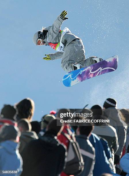 Norway's Kjersti Buaas competes during the second run of the Ladies' snowboard Halfpipe qualifying on the third day of the Turin 2006 Winter Olympics...