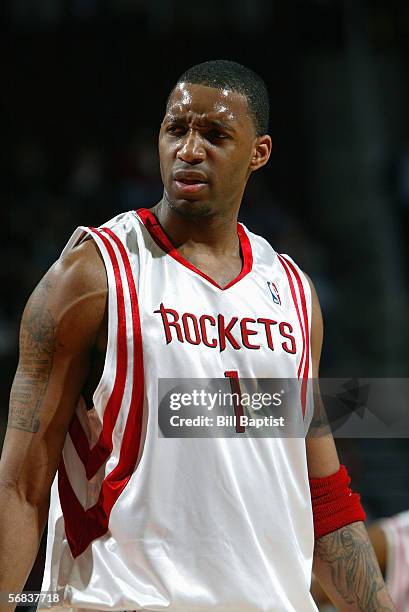 Tracy McGrady of the Houston Rockets looks on against the Charlotte Bobcats during the game at the Toyota Center on January 25, 2006 in Houston,...