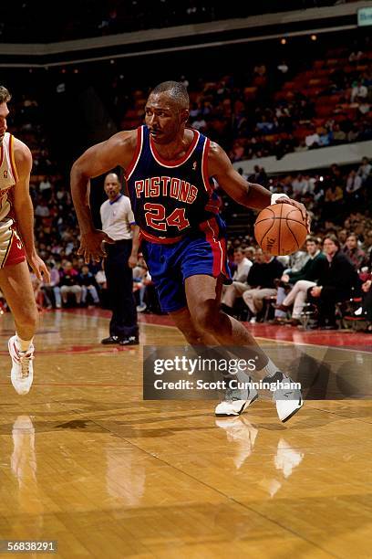 Mark Aguirre of the Detroit Pistons drives to the basket against the Atlanta Hawks during an NBA game at the Omni circa 1993 in Atlanta, Georgia....