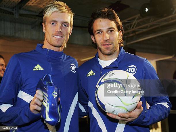 Christian Wilhelmsson poses with Alessandro Del Piero and their new +F50 Tunit shoes during the Major adidas +F50 Tunit Launch Event on February 13,...