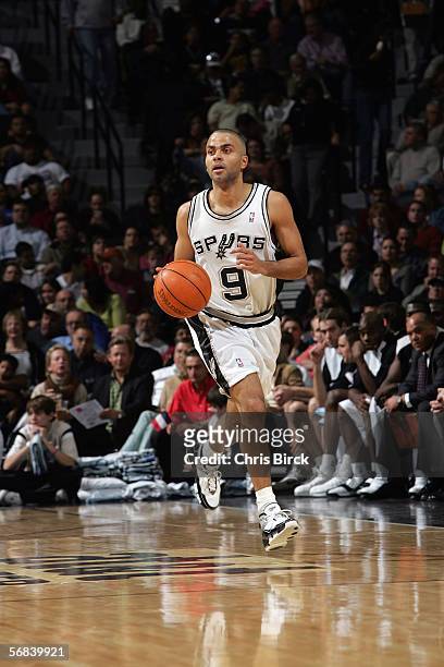 Tony Parker of the San Antonio Spurs moves the ball up court during a game against the Charlotte Bobcats at AT&T Center on January 24, 2006 in San...