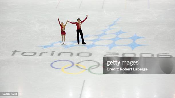 Tatiana Totmianina and Maxim Marinin of Russia wave to the crowd after they competed in the Pairs Free Skating Figure Skating during Day 3 of the...