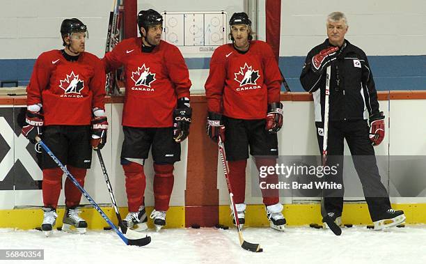 Brad Richards, Todd Bertuzzi, Ryan Smyth, and Pat Quinn take part in a light skate at the Canadian hockey team practice before leaving for Torino,...