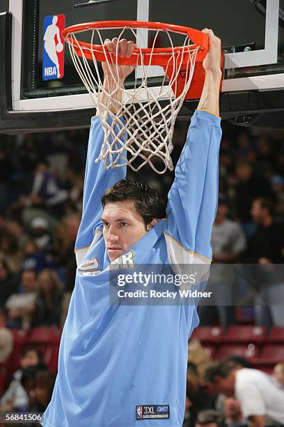 Eduardo Najera of the Denver Nuggets looks on during pregame warmups against the Sacramento Kings at Arco Arena on January 31, 2006 in Sacramento,...