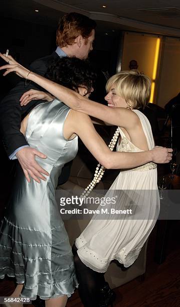 Actors Helen McCrory, Damian Lewis and Sienna Miller attend the UK Premiere of "Casanova" at Vue West End on February 13, 2006 in London, England.