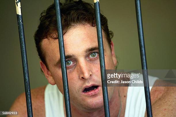 Martin Stephens looks on from his holding cell after his sentencing at Denpasar Court February 14, 2006 in Denpasar, on the Indonesian resort island...
