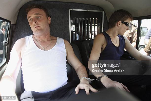 Martin Stephens and Michael Czugaj are transported away from Denpasar Courthouse in a police van after their sentencing trial February 14, 2006 in...
