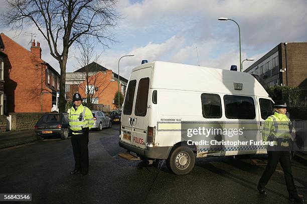 Police attend the scene of a burglary which resulted in a woman police officer being shot and seriously injured on February 14 Nottingham, England....