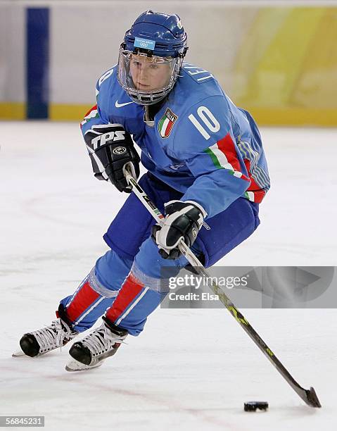 Michaela Maria Leitner of Italy skates with the puck during the women's ice hockey Preliminary Round Group A match on Day 4 of the Turin 2006 Winter...
