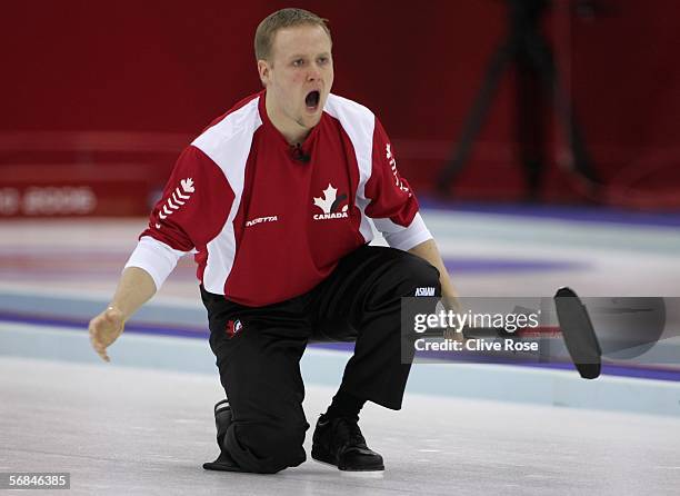 Mark Nichols of Canada looks on in anguish after playing a bad shot during the preliminary round of the Men's curling between Canada and Sweden...