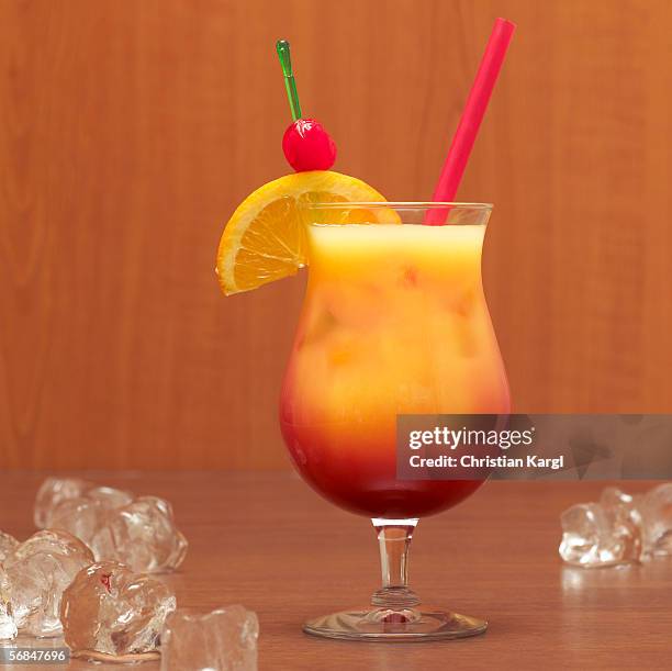 tequila with orange garnish, close-up - tequila sunrise stock pictures, royalty-free photos & images