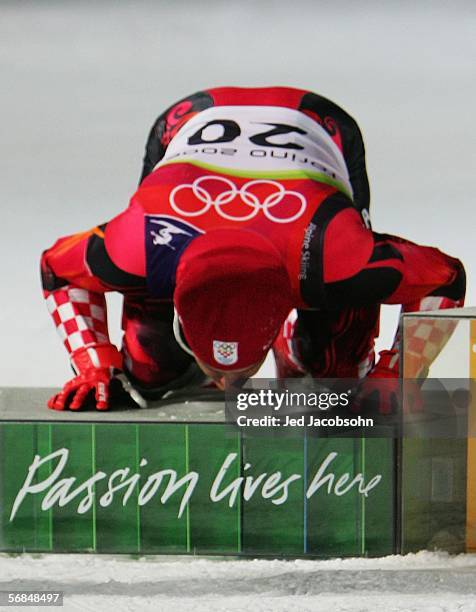 Ivica Kostelic of Croatia kisses the podium after winning the silver medal in the Mens Combined Alpine Skiing competition on Day 4 of the 2006 Turin...