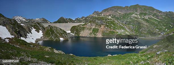 lago scuro and the naret dam, switzerland - scuro stock pictures, royalty-free photos & images