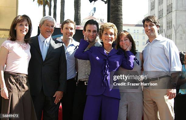 Television reality courtroom star Judge Judy Sheindlin poses with her family as she receives the 2304 star on the Hollywood Walk of Fame, poses with...