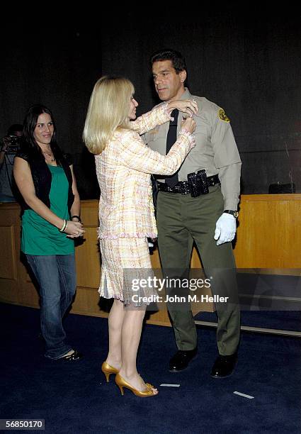 Carla Ferrigno pinned the Reserve Deputy Sheriff's badge on her husband Lou Ferrigno during graduation ceremonies from the Los Angeles County Deputy...