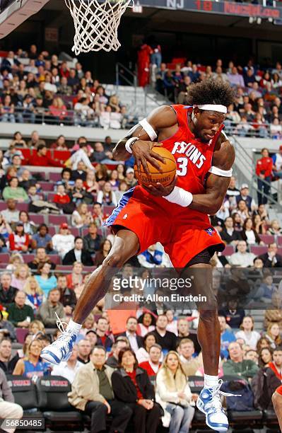 Ben Wallace of the Detroit Pistons rebounds against the New Jersey Nets on February 14, 2006 at the Palace of Auburn Hills in Auburn Hills, Michigan....