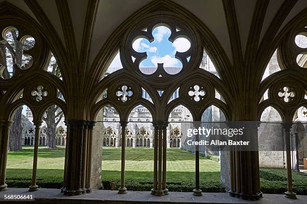 cloister walk windows in salisbury cathedral - cloister stock pictures, royalty-free photos & images