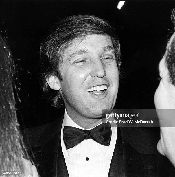 Close-up of American real estate developer Donald Trump attends Roy Cohn's birthday party at the Seventh Regiment Armory , New York, New York,...