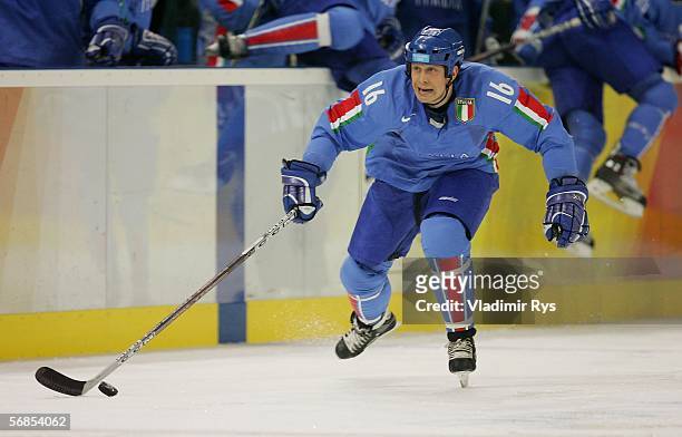 John Parco of Italy brings the puck down the ice during the men's ice hockey Preliminary Round Group A match against Canada on Day 5 of the Turin...