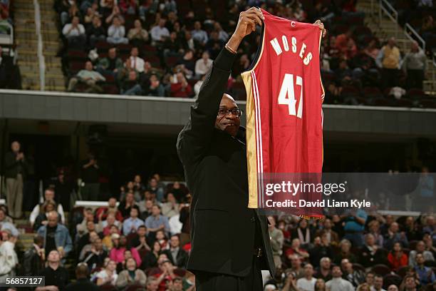 Olympic Gold medalist and member of the U.S. Track and Field Hall of Fame Edwin Moses holds a of the Cleveland Cavaliers jersey at a 2006 Black...