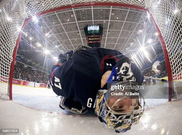 Goalie John Grahame of the United States lays back in the goal after giving up a second period goal to Herberts Vasiljevs of Latvia during the men's...