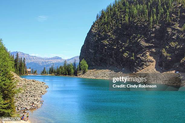 lake agnes amid the canadian rocky mountains. - lake agnes stock pictures, royalty-free photos & images