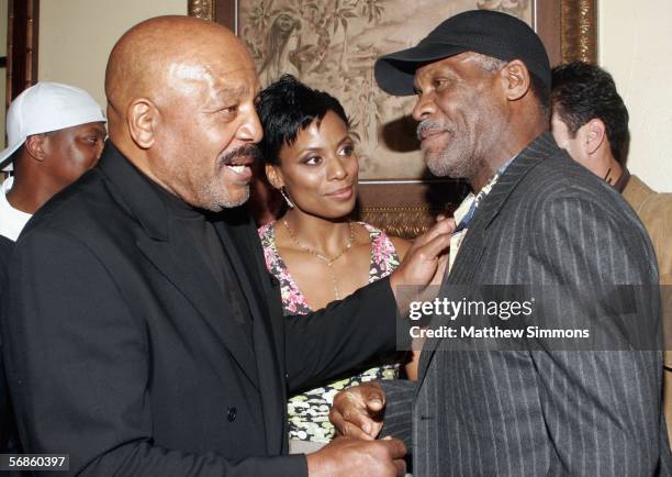 Football legend Jim Brown, Monique Brown and actor Danny Glover attends football legend Jim Brown's surprise birthday party at Crustacean on February...