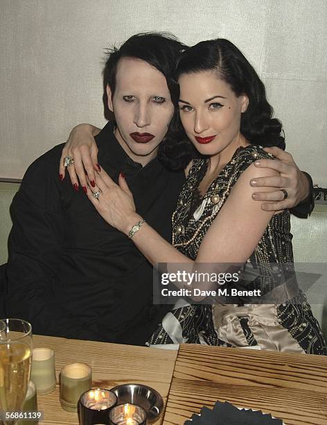 Musician Marilyn Manson and wife, dancer Dita Von Teese, attend the Universal Records after show party following The Brit Awards 2006 with...