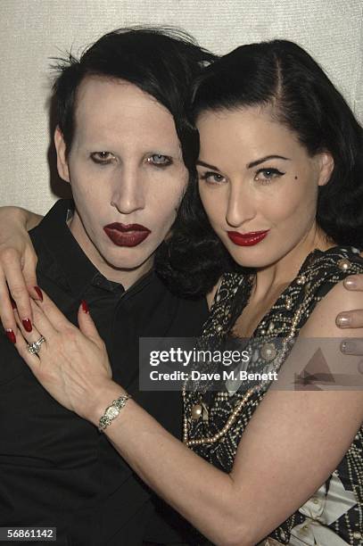 Musician Marilyn Manson and wife, dancer Dita Von Teese, attend the Universal Records after show party following The Brit Awards 2006 with...