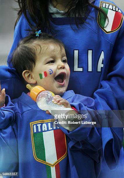 An Italian fan watches the game during the men's ice hockey Preliminary Round Group A match between Finland and Italy during Day 6 of the Turin 2006...