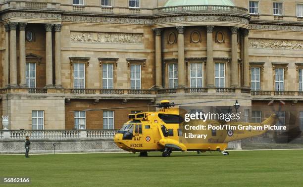 Royal Air Force Sea King Mark 3 rescue helicopter lands on the lawns of Buckingham Palace on February 15, 2006 in London, England. Emergency response...