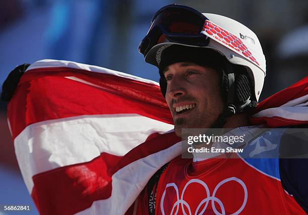 Seth Wescott of the United States celebrates his gold medal in the Mens Snowboard Cross Final on Day 6 of the 2006 Turin Winter Olympic Games on...