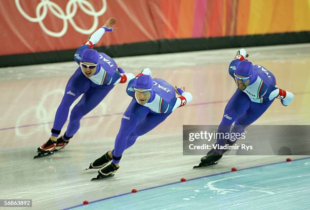 Matteo Anesi Enrico Fabris and Ippolito Sanfratello of Italy skate on their way to defeating Canada with a time of 3:44.46 to win the gold medal in...
