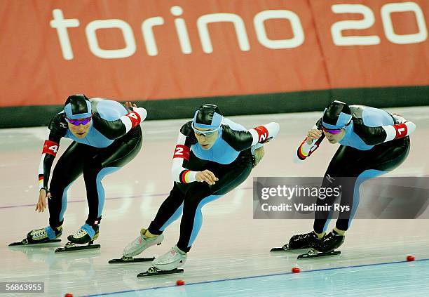 Claudia Pechstein, Anni Fiesinger and Daniela Anschuetz Thoms of Germany skate on their way to a Gold Medal against Canada in women's speed skating...